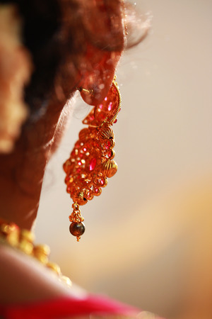 Beautiful wedding earring with pearls on the earの写真素材