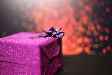 Merry Christmas and happy new year concept, Closeup of gift box with bokehの写真素材