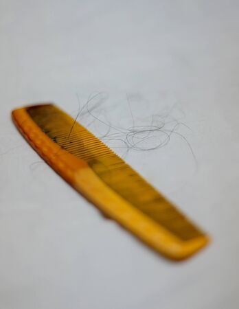 hair loss problem on hairbrush isolated on white backgrounds