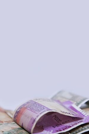 Close up of Indian 2000 rupee notes, Indian currency note Folded on white backgroundの写真素材