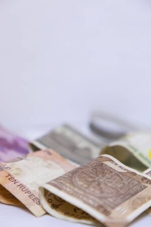 Indian currency bank notes of 10, 20 rupees, Indian currency note Folded on white background