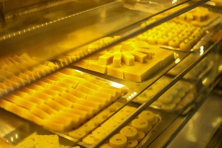 Various Sweet Food In Display Cabinet For Sale