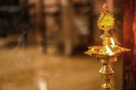 Traditional south indian brass oil lamp 'Nilavilakku '. During events like housewarming,の写真素材