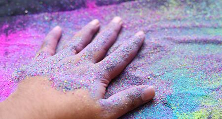 Color in hand , Indian Festival Holi Background