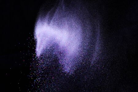 Colorful dust explode at black background. Celebrate Indian Holi festival