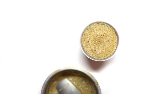 Indian Home made filter coffee on white backgroundsの写真素材