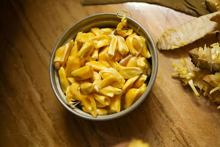 Fresh jackfruit slices on a plate. sweet yellow jackfruit ripe. vegetarian, veganの写真素材