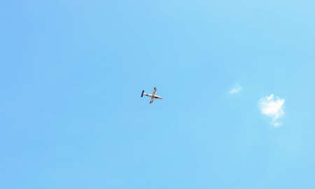 An Indian Coast Guard helicopter flying in the sky backgrounds