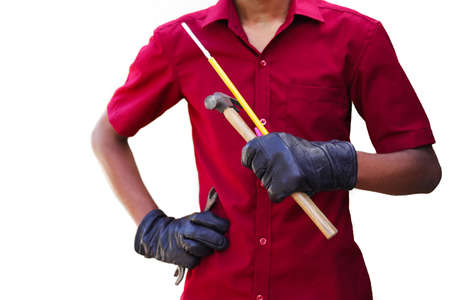 Cropped image of mechanics working in auto service. hand holding Metalic Wrench