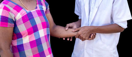 Doctor checking woman patient arterial blood pressure.