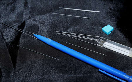 Back to school concept with stationery supplies on black clothe
