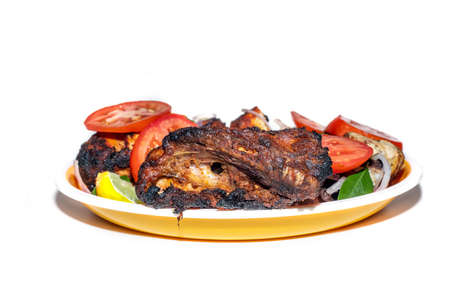 homemade tandoori chicken served with salads.