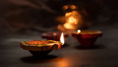 Happy Diwali - Diya lamps lit during diwali celebrations