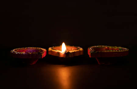 Happy Diwali - Diya lamps lit during diwali celebrations