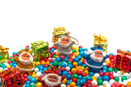 Santa Claus with colorful balls and Gift boxes on white backgroundsの写真素材