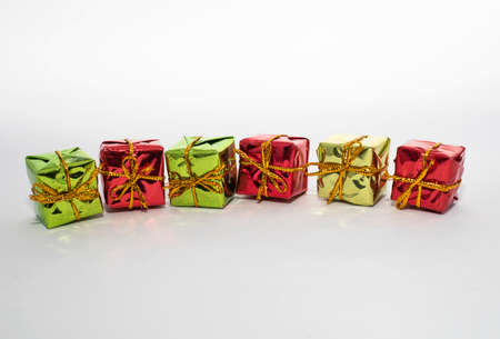 Beautiful colored gift boxes with white backgrounds.の写真素材