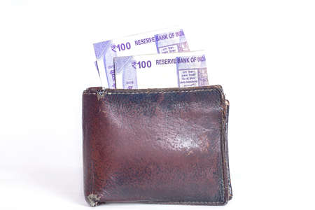 Wallet with One Hundred Rupees Indian Currencies Note