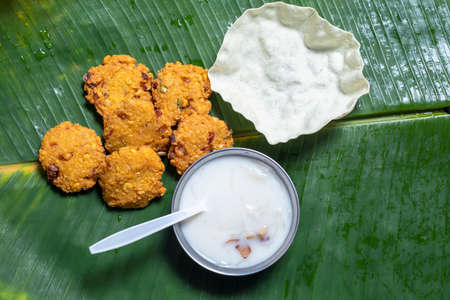 traditional dish served on banana leaf on Indian festival day. It is served as Ganesha Chaturthi,...