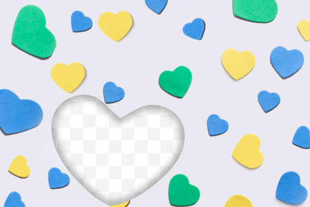 Valentine's Day background. Isolated multi-colored hearts with transparent heart frame on white backgrounds.の写真素材