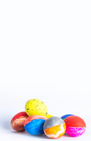 Colorful easter eggs isolated on white background with space for text. Happy easter.の写真素材