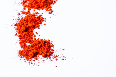Colorful holi powder isolated on white background. Holi is Indian festival of colors. Top view.の写真素材