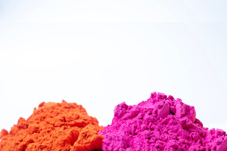 Pile of colorful holi powder isolated on white background. Closeupの写真素材