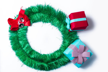 Merry Christmas wreath and gifts isolated on white background. Top view.の写真素材