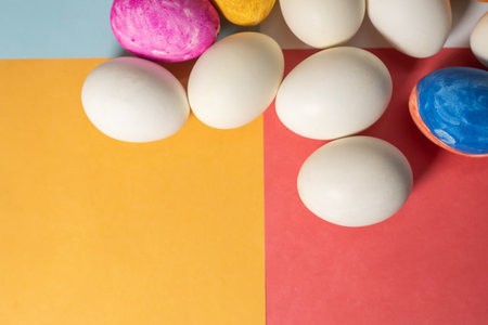 Happy Easter concept. Colorful easter eggs on colorful background. Top view.