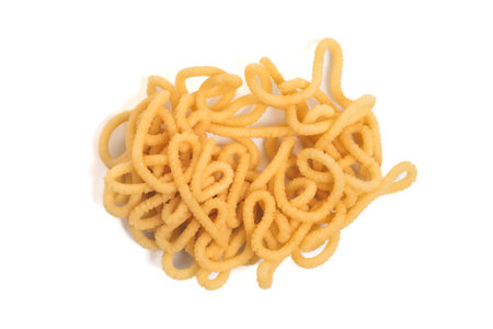 Traditional South Indian crunchy murukku snack isolated on white background. Top view.の写真素材