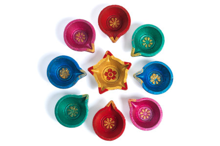 Colorful Decorative Diyas in Circular Pattern for Diwali Festival Celebrationの写真素材
