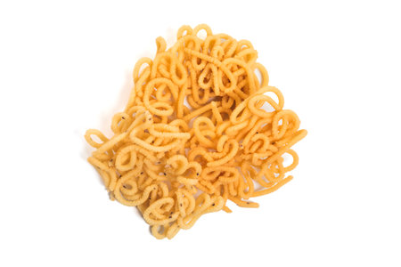 Traditional South Indian crunchy murukku snack isolated on white backgroundの写真素材