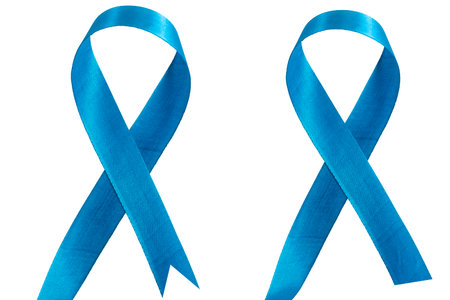 Blue ribbons symbolizing awareness, advocacy, and support for charitable causes, on a white background.の写真素材