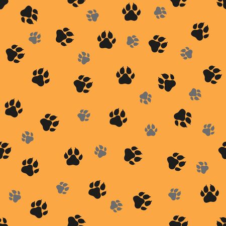 Dogs paws traces. illustration. Black and grey stamps on orange background. Seamless pattern. For logo, wallpaper, fabric, packing, wrapper, scrapbooking, digital paperの写真素材