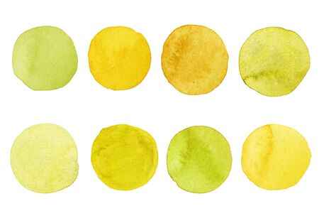 Set of yellow watercolor dots. Hand painted Spots on a white background. Round, circle. Isolated. Blobs of different colorの写真素材