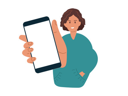 Smiling positive girl holding mobile smart phone with blank screen isolated on while background. Phone mockup with copy space. Vector icon flat illustration. Application on touch screen device.のイラスト素材