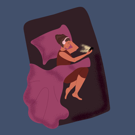 Young girl lies in her bed with headphones on and looks at her phone in dark. Girl resting alone, not sleeping, dreaming. Danger of dependence on gadgets. Cartoon Vector illustration in Flat styleのイラスト素材