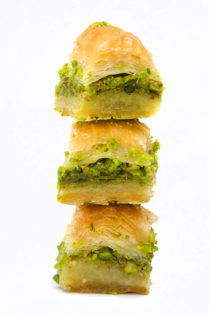 Baklava with pistachio on a white backgroundの写真素材