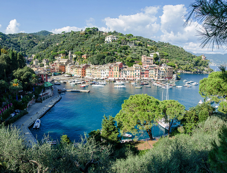 The beautiful Portofino panorama with colorfull houses, luxury boats and yacht in little bay harbor. Liguria, Italyの写真素材