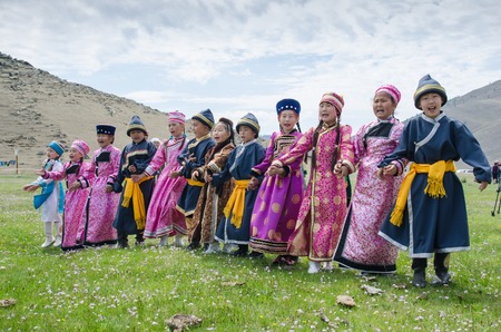 Bayanday, RUSSIA - JUNE 14: yordinskiye games, Buryat children in national costumes sing songs in yordynskyh games, June 14, 2015 in Bayanday, Irkutskiy region, Russia.のeditorial素材