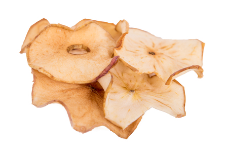 Top view of dried apple chips isolated on whiteの写真素材