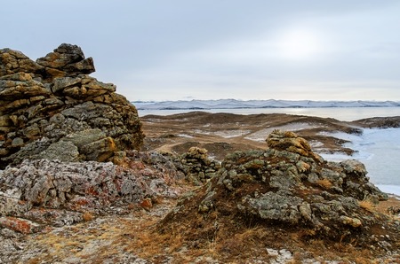 View above big beautiful lake and mountain in winter, Baikal lake, Russiaの写真素材