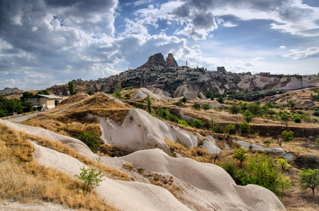 Ancient town and a castle of Uchisar dug from a mountains, Cappadocia, Turkeyの写真素材