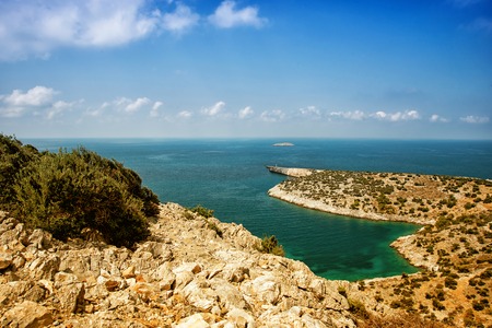 Beautiful calm bay with pine trees and blue clear sea at warm sunny summer day. Mediterranean sea,...