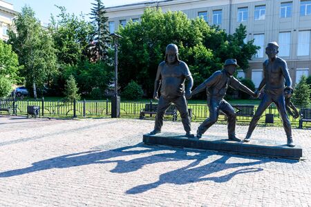 Russia, Irkutsk - July 7, 2019: A scene from the film Caucasian Captive - Trus, Byvalyi and Balbes. The monument for countryman installed in Irkutskのeditorial素材