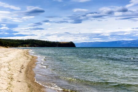 Lake Baikal and mountains of Siberia with beautiful sky and clouds, Russia Oklhon islandの写真素材