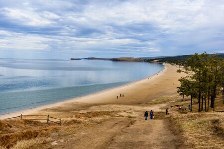Lake Baikal, trees and mountains of Siberia with beautiful sky and clouds, Russia Oklhon islandの写真素材
