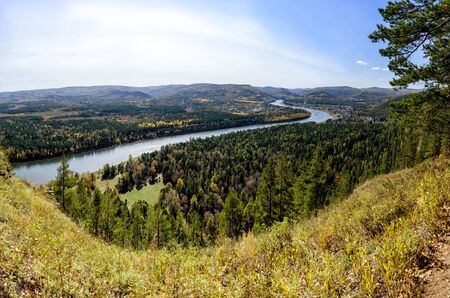 River, rock and autumn forest. View from above.
