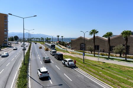Izmir, Turkey - August 30, 2019: Coastal cityscape with walking people, Izmir