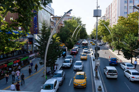 Ankara, Turkey - June 23, 2018: Street in Kizilay district in a busy day with people and cars around...