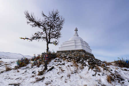 Lake Baikal, Russia - March 10, 2020: Buddhist Stupa at Ogoy island on Baikal lake. Ogoy is the largest island in the Maloe More strait of Lake Baikal.のeditorial素材